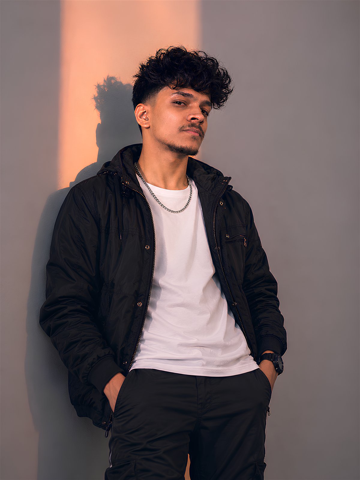 DJ S33K3R in a full-length editorial portrait